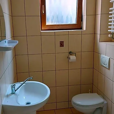 Goscinne Tomasz Rum i privatbostad Międzywodzie